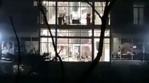Thumbnail for South Africa - black looter breaks glass on top floor of a South African mall, falls multiple stories [2021/July]