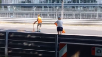 Thumbnail for German climate idiots throwing oil on a race track