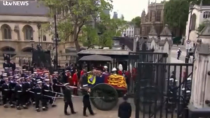 Thumbnail for Queen's coffin taken in procession to Westminster Hall.