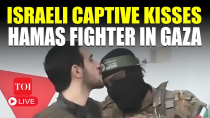 Thumbnail for LIVE: Israeli Hostage Kisses Al-Qassam Fighters; UNBELIEVABLE Scenes At Hamas Event In Gaza | Times Of India