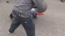 Thumbnail for BLM protestor picks up large piece of concrete, is immediately dropped by rubber bullet to the head