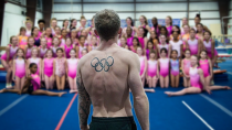 Thumbnail for 1 Olympian vs 100 Elite Gymnasts | Nile Wilson
