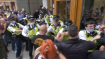 Thumbnail for Batons out: Clashes in London as protesters demonstrate against vaccine passports - bong zogbots use batons against Britains protesting the jewish tyranny. 