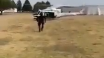 Thumbnail for South Africa - black helicopter pilot training anti-looter SWAT, lands on top of some [2021/July]