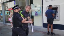 Thumbnail for Guy buys a baseball bat in a british sports store. Gets arrested immediately after crossing the door
