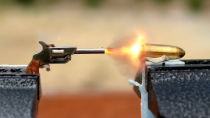 Thumbnail for Can a 2 Inch Gun Fire a 1 Inch Bullet? - 300,000FPS - The Slow Mo Guys | The Slow Mo Guys