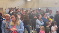 Thumbnail for General frustration in a Marine Le Pen supporter meetup. Two men on the right side of the video do not seem too disappointed with the results.