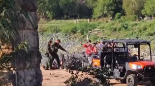 Thumbnail for Texas Border Patrol agents cutting barbed wire to allow illegal migrants through the U.S.