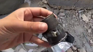 Thumbnail for Palestinian woman does not know what grenade casings look like 