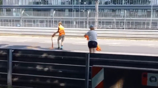 Thumbnail for German climate idiots throwing oil on a race track