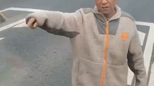 Thumbnail for Heart-wrenching video of a worker in Shanghai, who stops a truck to expose his desperation and hunger. Man breaks down crying when given bananas and crackers