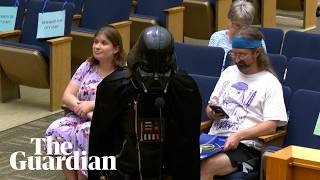 Thumbnail for 'Darth Vader' makes the case for Flock cameras at city council meeting | Guardian News