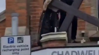 Thumbnail for Muslims in England tear a cross off a church -- in broad daylight. 