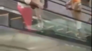 Thumbnail for These shoppers in Cameroon used an escalator for the first time and it went exactly how you'd expect