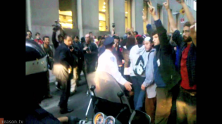 Thumbnail for NYPD Cop Punches Protester at Occupy Wall Street, 10/14/11