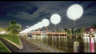 Thumbnail for Germans Celebrate the Fall of the Berlin Wall with Lights and Balloons
