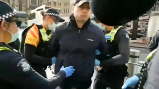 Thumbnail for State of Australia. Man arrested for standing in the street.