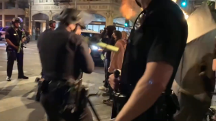 Thumbnail for Tantrum Night 2022 protestor uses a makeshift flamethrower against police