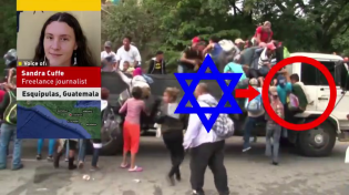 Thumbnail for A Star of David is emblazoned on the door panel of a truck transporting a load of Honduras who are making their way through Guatemala towards the US