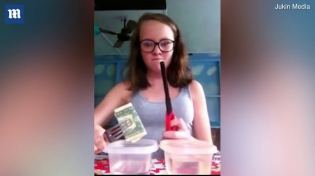 Thumbnail for Girl sets fire to table in science experiment gone horribly wrong | Daily Mail