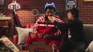 Thumbnail for Pizza Hut commercial has obese Nigger fed by white guy then beats him 